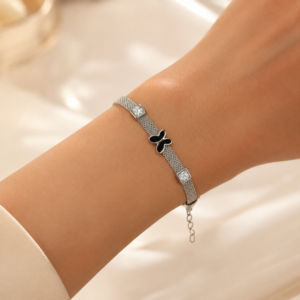 Selene black butterfly crystal bracelet worn by a woman