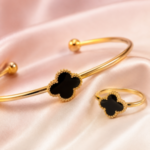 Amara black clover bracelet and ring set worn on hand