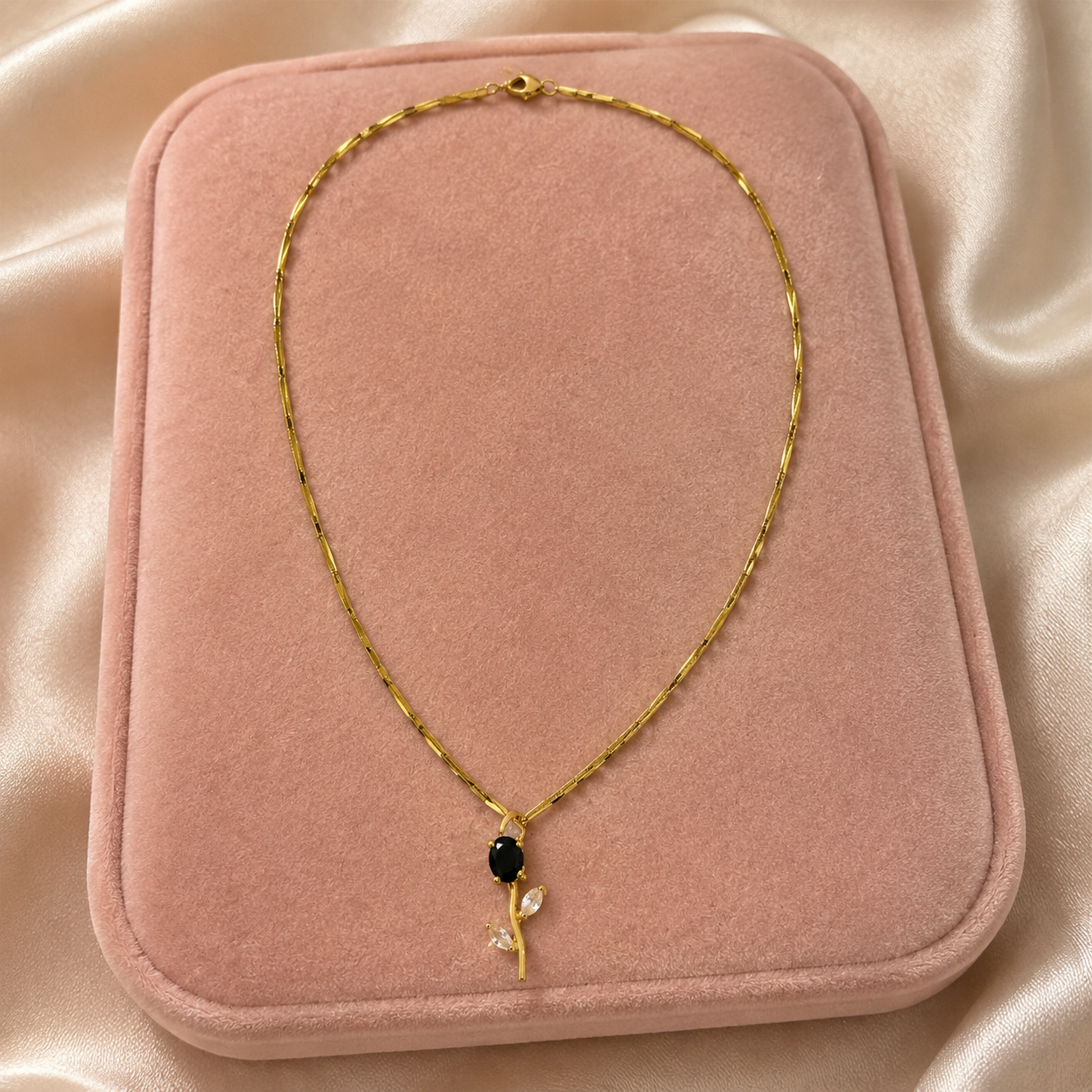 Florea Midnight Black flower pendant necklace with clear leaves