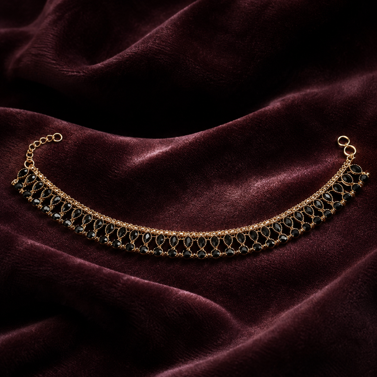 Woman wearing Noira black stone anklet