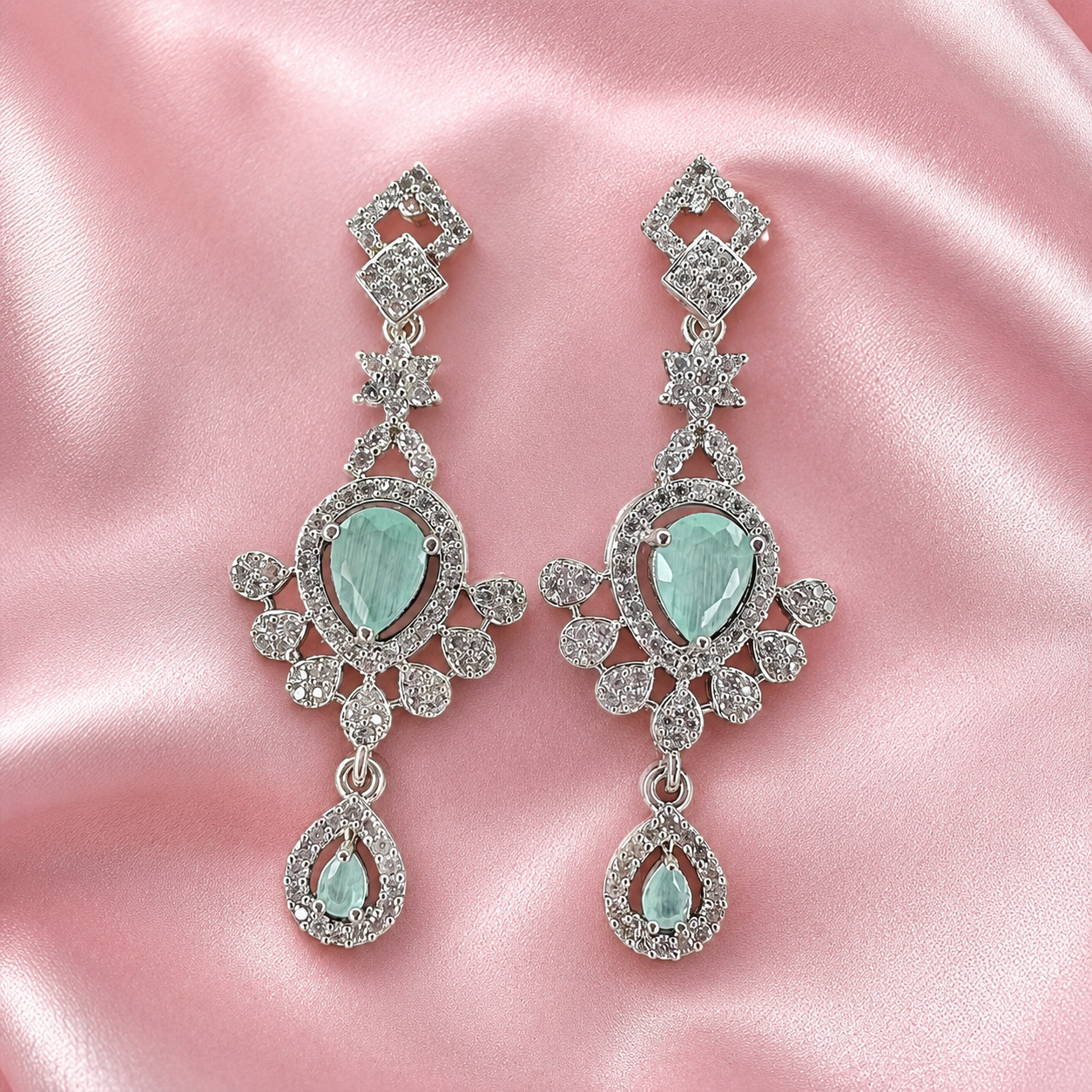 Close-up of aqua teardrop stone and clear crystal detailing